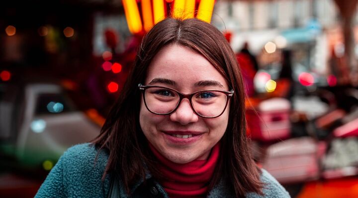 Teen Wearing Glasses And Red Turtleneck